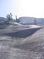 Glacier polish on the Apron's Banana Peel rock climbing route.