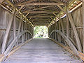 The Burr arch truss design on the inside of the bridge