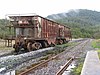 Two rusty hopper cars on the Melba Line in 2009