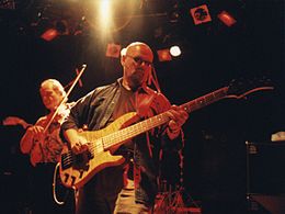 Allen Sloan (left) and Andy West (center) of Dixie Dregs live in 1999