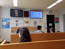 A waiting room at the Berlin Immigration Office.