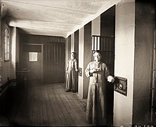 Female inmates in front of their cells, 1895