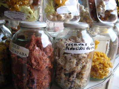 Colombian cocadas in jars.