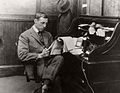 Image 2D. W. Griffith at a rolltop desk, c. 1925 (from 1920s)