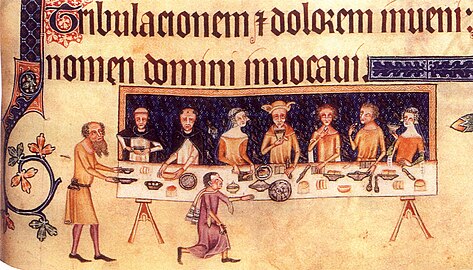 A 14th-century drawing of people eating. Scenes like this would have taken place in castles.[8]