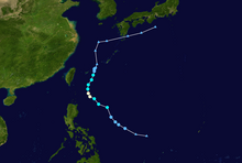 A track map showing the path of a severe tropical storm over the Philippine and East China Seas. The track begins with an erratic northwestward motion before slowly curving to the north while located just northeast of the Philippines/east of Taiwan. After crossing the Ryukyu Islands and entering the East China Sea, the system abruptly turns to the east-northeast and grazes the southern coast of Japan before dissipating.