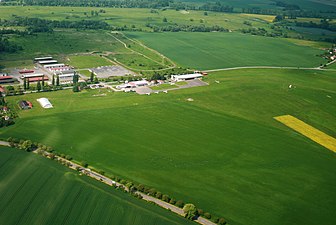 Aerial photo of Jaroměř airport, the park is the uppermost green strip seen above it.