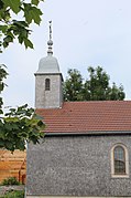 La chapelle Saint-Claude à Jougne Jura aux murs et clocher recouverts de tavaillons.