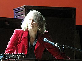 Allen performing at a Mott the Hoople reunion gig, Hammersmith Apollo, October 2009