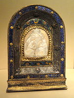 Pax with the Annunciation in shell cameo, gilded silver, copper, enamel. German or Netherlandish shell carving (c. 1500), setting probably Italian(c.1500–1520)