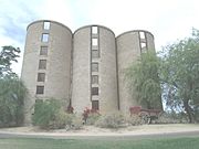 The Heard Ranch Grain Silos were built in 1930 and are located within the golf course of the Legacy Resort in the vicinity of 30th Street and Vineyard Road. The ranch belonged to businessman Dwight B. Heard, who is given much of the credit for the Arizona Republic newspaper (of which he was publisher), the Heard Museum and the development of the vital irrigation canals and the Arizona cattle industry. The property was listed in the Phoenix Historic Property Register in March 1993.