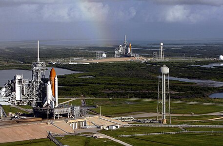 Space Shuttles on launch pads, by NASA