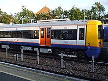 New unit with white paintwork, blue and orange stripes and yellow cab ends