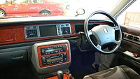 1997 Century driver's seat. Note that the steering wheel design was later adopted for various Toyota models throughout the 2000s.