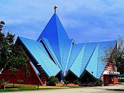 Church of the Blessed Sacrament's most striking feature is the dramatically structured slate roof constructed in folds to symbolise the "tent of meeting" in the Old Testament of the Bible