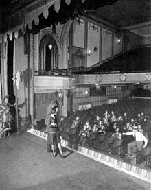 Constance Carpenter and Gaxton, principals of the Broadway production of A Connecticut Yankee, at the Vanderbilt Theatre during a mid-run rehearsal of the hit musical (1928). Producer Lew Fields is seen at right, in shirtsleeves.