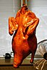 Peking duck, being dried
