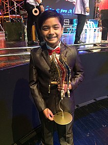 Noel Comia Jr., with his award for Best Actor at Cinemalaya 2017