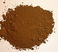 Raw umber; the higher manganese oxide content makes it darker