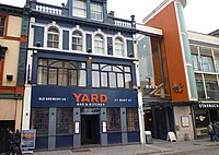 The Yard pub and entrance to the Brewery Quarter