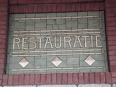 Écriteau de l'ancien restaurant.