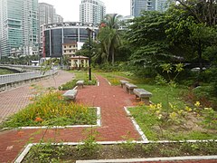 Poblacion Park with Rockwell Center and S.C. Johnson & Son, Inc. Philippine office in the background