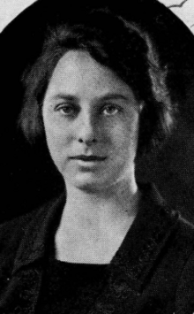 Yearbook photo of a young white woman with dark hair