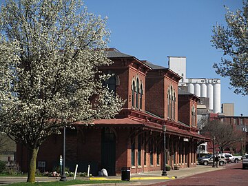 Old rail depot (now the Pufferbelly restaurant) and mill, April 2013