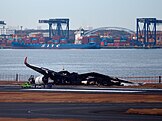 Wreckage of the Japan Airlines Airbus A350 involved in the crash