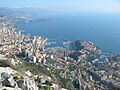 Image 48In the centre is La Condamine. At the right with the smaller harbour is Fontvieille, with The Rock (the old town, fortress, and Palace) jutting out between the two harbours. At the left are the high-rise buildings of La Rousse/Saint Roman. (from Monaco)