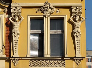 Window decoration with herms