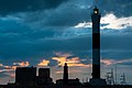 The 1961 lighthouse with the 1904 lighthouse and Dungeness A Nuclear Power Station beyond