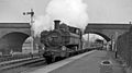 Down goods train passing under the LMR viaduct in 1962