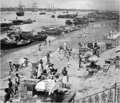 Boats and men on the banks of the Hooghly river, 1915