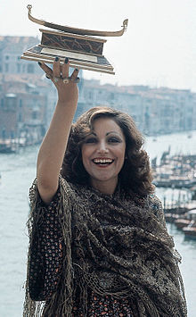 Mia Martini in Venice in 1973, holding the Gondola d'Oro prize won with her song "Donna sola"