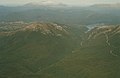 Mount Huxley from the air, at left, King River Gorge centre, Mount Jukes Highway to right, and Lake Burbury and the Crotty Dam at rear.