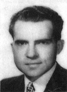 ID photo of a young man wearing a suit and tie