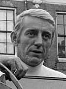 Black-and-white picture of Rod McKuen looking far away.