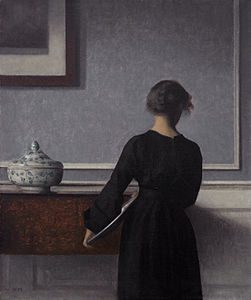 Interior with Young Woman Seen from the Back, by Vilhelm Hammershøi
