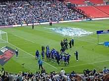 Millwall players celebrating their play-off final victory