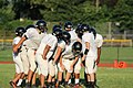 Hamilton West Hornets huddle, September 2013 in a football game vs the North Brunswick Raiders