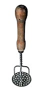 A potato masher with a wooden handle