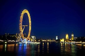 London Eye floodlit in gold in celebration of the Queen's Golden Jubilee