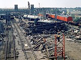 View of crash site during the clear up, showing the extent of damage to the surrounding infrastructure.