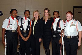 Jeri Kehn Thompson and Marsha Blackburn with a color guard group