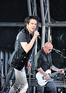 Pat Monahan and Jimmy Stafford of Train performing in January 2011