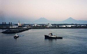 Puerto Quetzal seen at dawn, with the volcanoes on the horizon