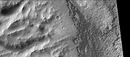 Part of Dawes Crater showing eroding wall on left and dunes on crater floor on the right. Picture taken with CTX camera (on Mars Reconnaissance Orbiter).