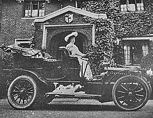 black-and-white photograph of Marshall in a car