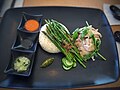 Hainanese chicken rice with a condiment tray